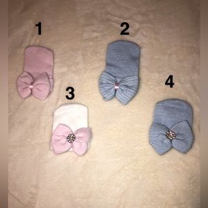 Baby girl receiving hats with bow